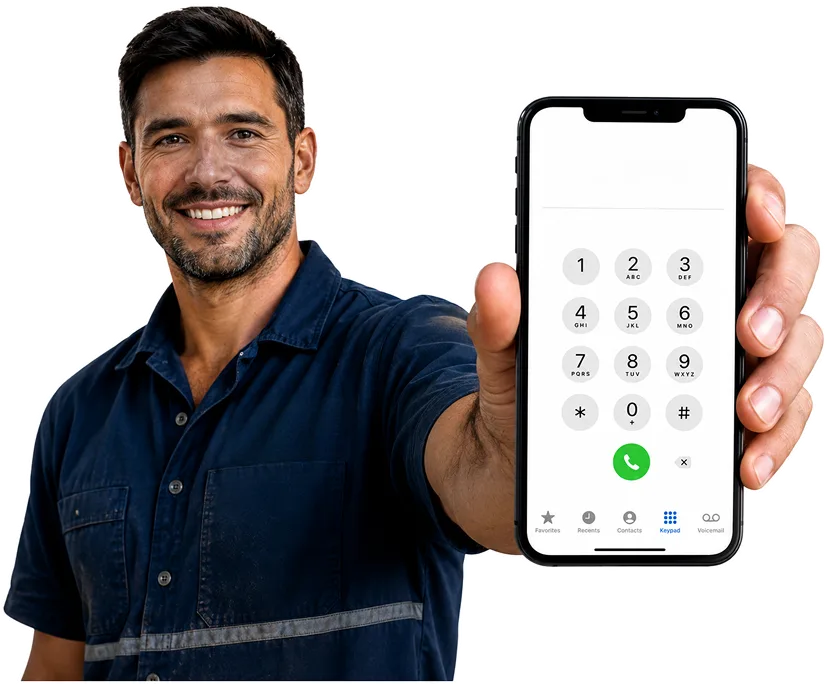 Plumber on the phone taking a Gymea callout
